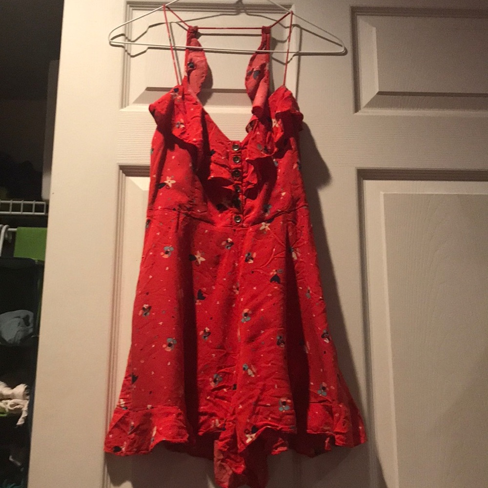 Backless red romper